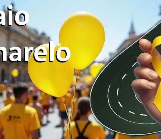 Maio Amarelo em Rio Grande: Abertura Oficial Acontece Nesta Quarta-feira com Palestras de Segurança no Trânsito Em uma rua movimentada e ensolarada, várias pessoas usando camisetas amarelas participam de uma campanha de conscientização. No primeiro plano, três balões amarelos flutuam em destaque. À direita da imagem, há uma ilustração de uma estrada curva e uma mão segurando um laço amarelo, símbolo da campanha Maio Amarelo, que promove a segurança no trânsito. No topo esquerdo da imagem, está escrito em letras brancas grandes: "Maio Amarelo". A atmosfera é alegre e engajada, com prédios históricos compondo o fundo.